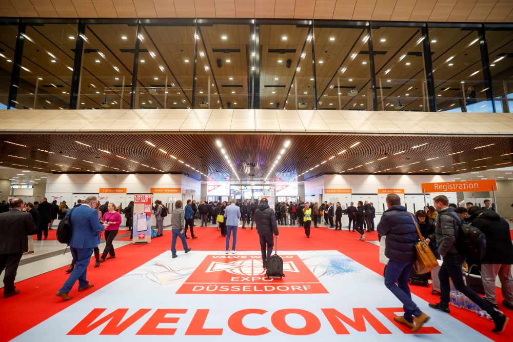 Picture of exhibition attendees entering Messe Dusseldorf.